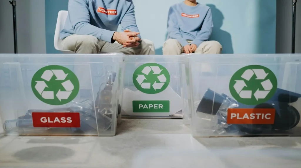 Food scrap separation helping household waste sorting through clearly labeled bins