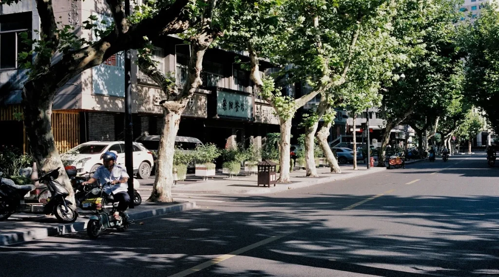 Pavement stays hot longer on a city street during a warm afternoon