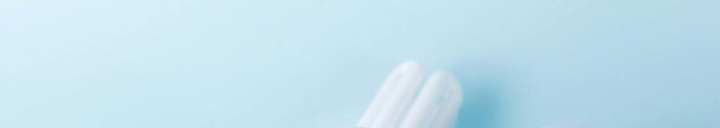 Home energy efficiency represented by an LED light bulb in a household setting