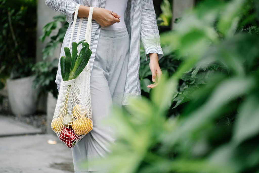 Reusing everyday items through pantry storage in glass jars and reusable containers