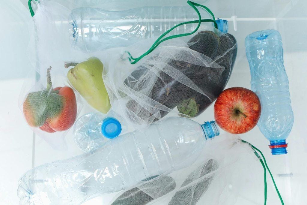 Sustainable home habits shown through reusable storage and low-waste kitchen choices