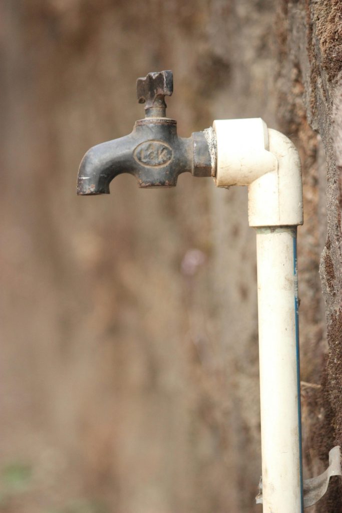 Drought conditions affecting household water access through a dry outdoor faucet