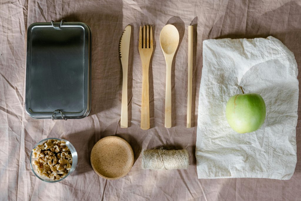 Low-waste kitchen cleanup with reusable cloths and compost-ready food scraps