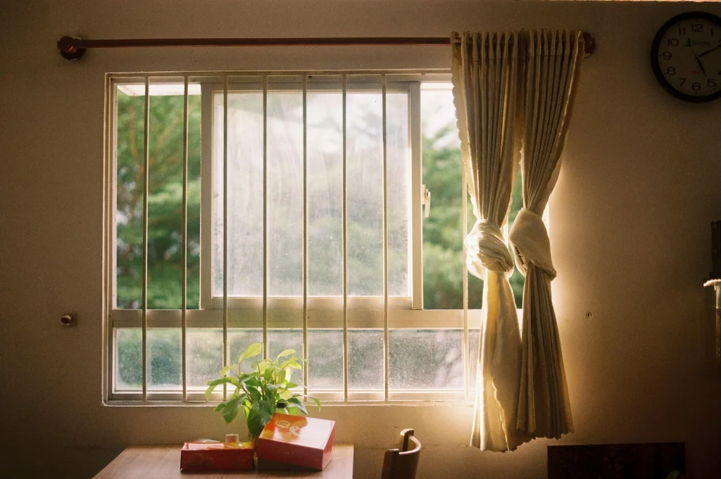 Hot afternoons managed upstairs with curtains drawn to reduce solar heat in upper rooms