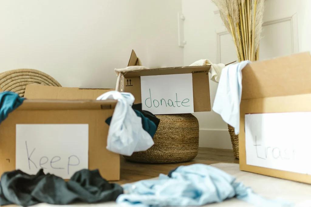 Small donation box at home collecting clothes and useful items before they avoid the trash