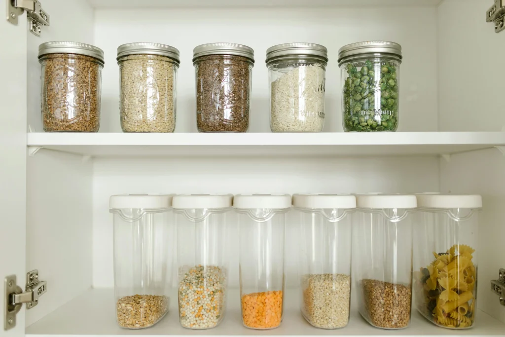 Use-first shelf with leftovers and meal ingredients organized to support a practical kitchen routine