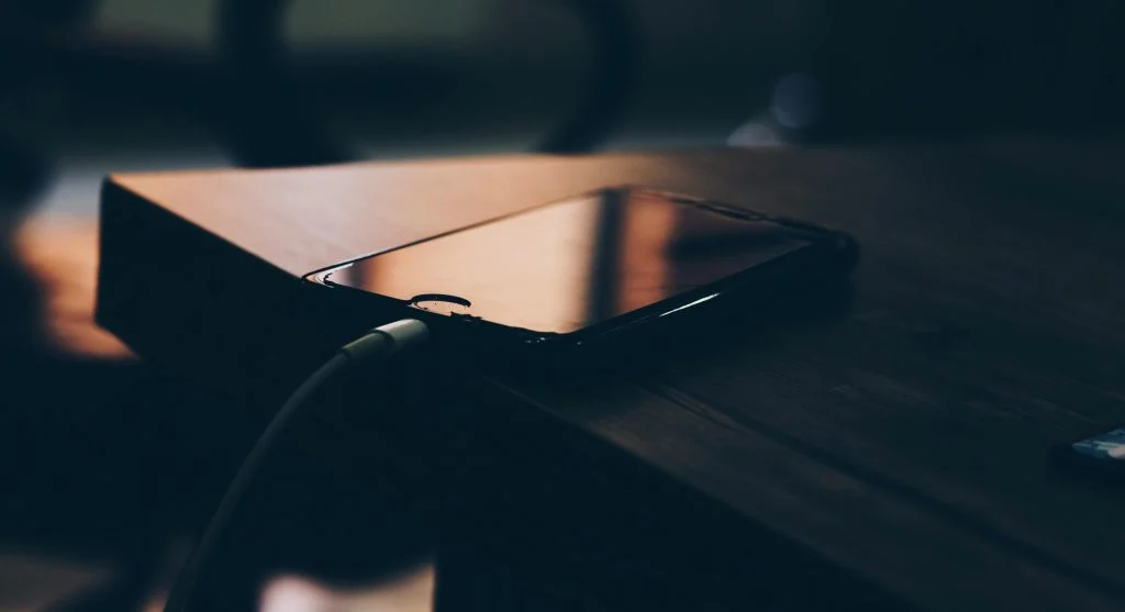 Evening device charging habits affecting home electricity use with multiple devices charging at night