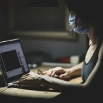 Using task lighting at night to brighten one work area instead of lighting a whole room